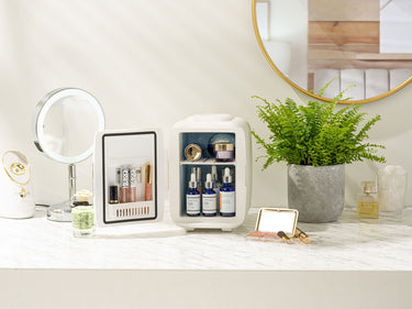Subcold classic 4L white skincare fridge with makeup and cosmetic products inside
